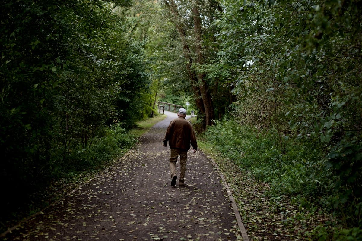Person writing in a journal to process difficult emotions